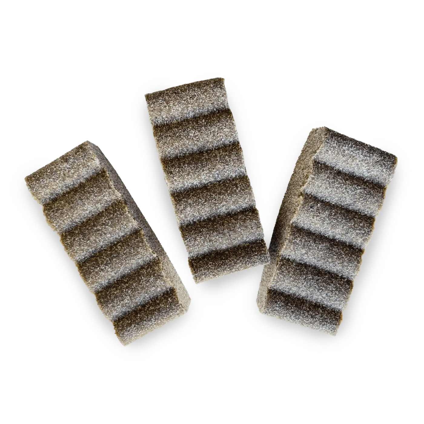 Three striped sanding blocks on a white background