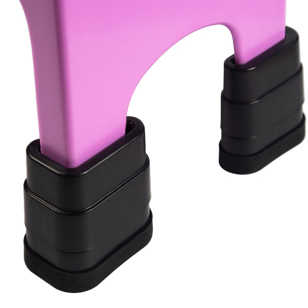 Close-up of a pink object with black cylindrical components on a white background