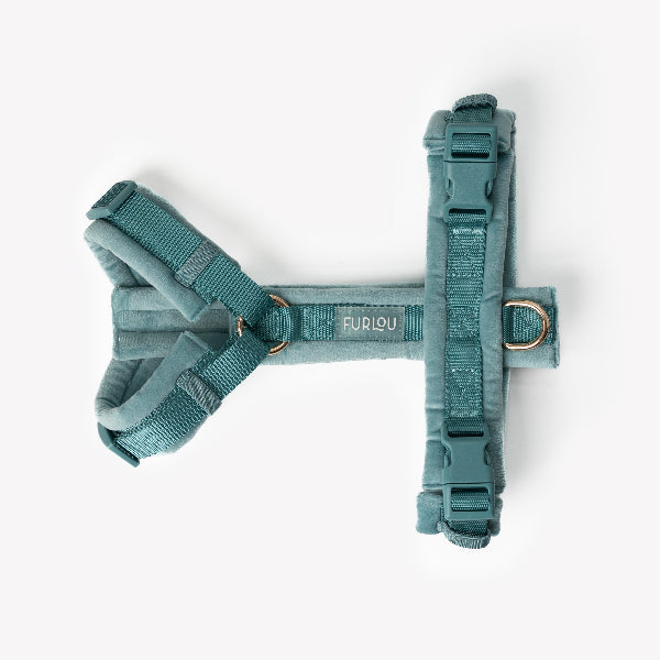 Teal dog harness with 'Furlou' branding on a white background